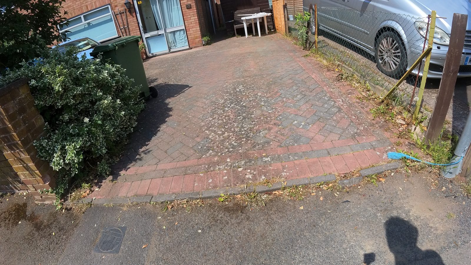 Block paving driveway before cleaning